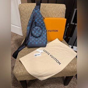 Authentic LV Louis Vuitton Leather Duo Sling Monogram Shadow Blue M46562